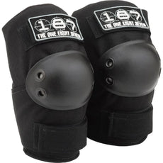 Pair of black 187 Killer Pads Standard XS elbow pads with hard-shell caps, dual rivets, wraparound straps and white logos. - Longboards USA