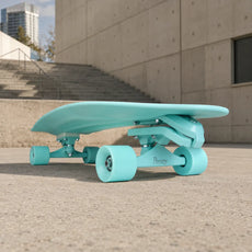 Penny Original 29-inch Mint surfskate skateboard with matching deck, wheels and trucks, viewed from a low side angle. - Longboards USA