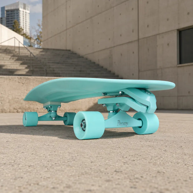 Penny Original 29-inch Mint surfskate skateboard with matching deck, wheels and trucks, viewed from a low side angle. - Longboards USA