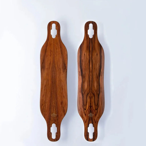 Two Arbor Axis 37 Flagship drop-through longboard decks with brown wood grain and elongated truck cutouts. - Longboards USA
