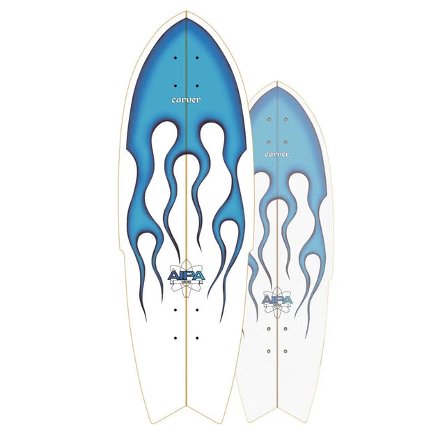 Carver Aipa Sting 30-inch surfskate deck with Sugarcoat, white finish, blue flame graphics and centered Aipa logos. - Longboards USA