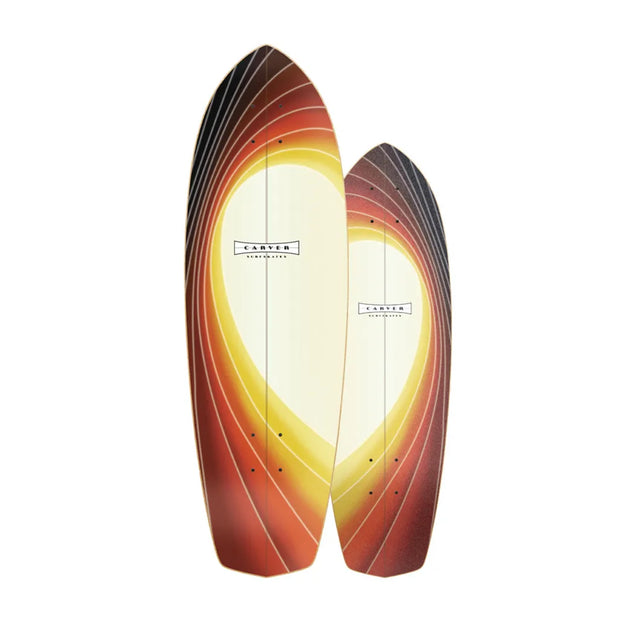 Carver Glass Off 32-inch surfskate cruiser deck in red and yellow, shown on both sides with curved stripe graphics. - Longboards USA